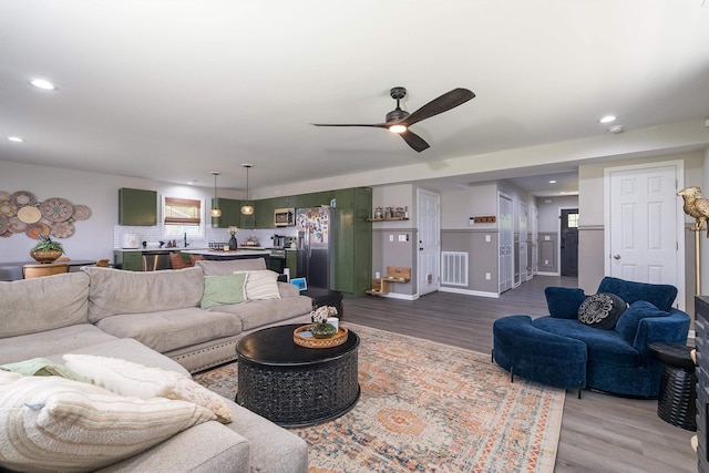 16715 Prospect Ave E, Elkton, VA 22827 - living room featuring ceiling fan, recessed lighting, and wood finished floors