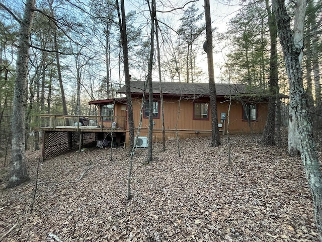 view of home's exterior featuring a deck