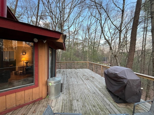 wooden deck with grilling area