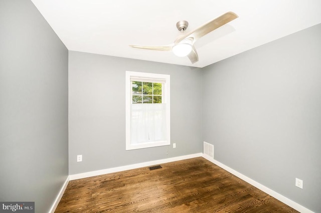 14906 Laurel Point Ln, Spotsylvania, VA 22551 - empty room with a ceiling fan and dark wood finished floors