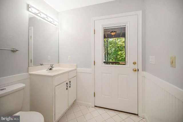 14906 Laurel Point Ln, Spotsylvania, VA 22551 - half bath with wainscoting, vanity, and tile patterned flooring