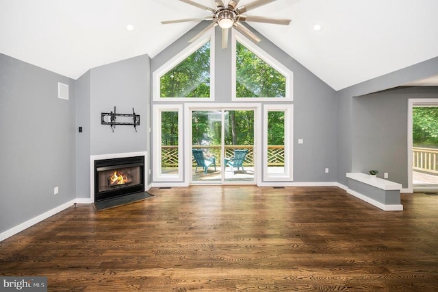14906 Laurel Point Ln, Spotsylvania, VA 22551 - unfurnished living room with a fireplace with flush hearth, ceiling fan, dark wood finished floors, and high vaulted ceiling