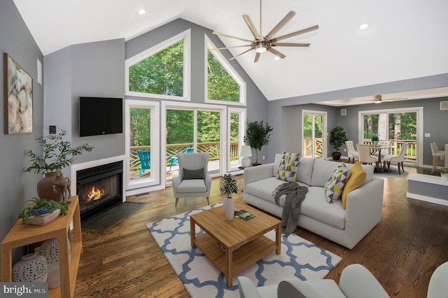 14906 Laurel Point Ln, Spotsylvania, VA 22551 - living area with a ceiling fan, high vaulted ceiling, a fireplace with flush hearth, wood finished floors, and recessed lighting