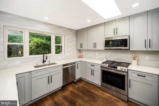 14906 Laurel Point Ln, Spotsylvania, VA 22551 - kitchen with stainless steel appliances, gray cabinets, decorative backsplash, light countertops, and recessed lighting