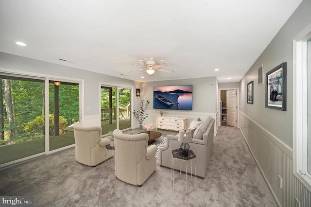 14906 Laurel Point Ln, Spotsylvania, VA 22551 - living area featuring wainscoting, carpet flooring, a ceiling fan, recessed lighting, and a decorative wall