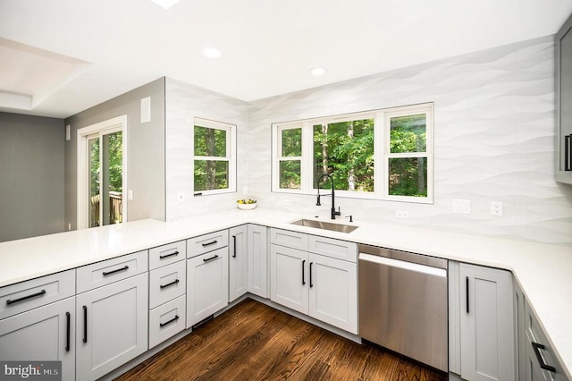 14906 Laurel Point Ln, Spotsylvania, VA 22551 - kitchen featuring dishwasher, light countertops, dark wood-style floors, a peninsula, and recessed lighting