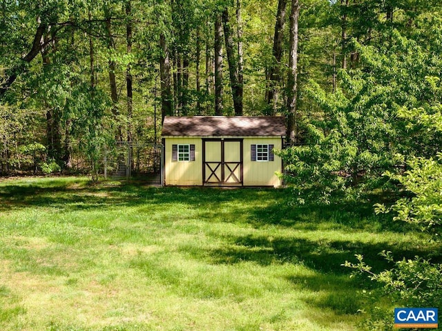 18220 Gregory Dr, Gordonsville, VA 22942 - view of shed with a wooded view and fence