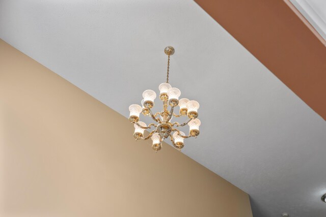 details with an inviting chandelier