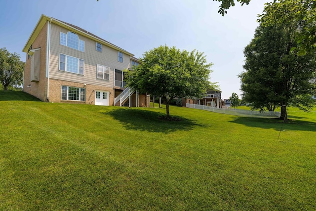 15 Brookmere Ct, Staunton, VA 24401 - rear view of house with stairway, brick siding, and a yard