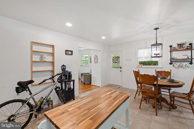  - dining space featuring recessed lighting and a chandelier