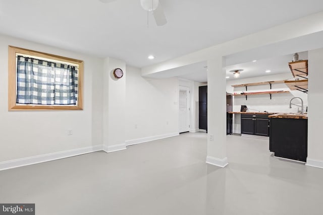  - unfurnished living room with concrete flooring, recessed lighting, and ceiling fan