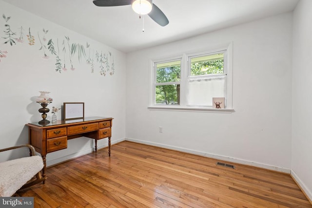  - office space featuring wood finished floors and a ceiling fan
