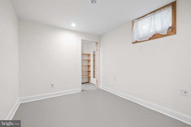  - below grade area with baseboards and recessed lighting