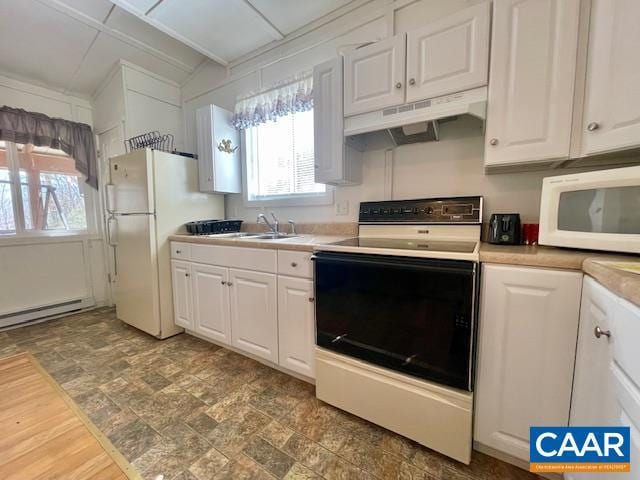 1308 Spruce St, Monterey, VA 24465 - kitchen featuring under cabinet range hood, white appliances, and white cabinets