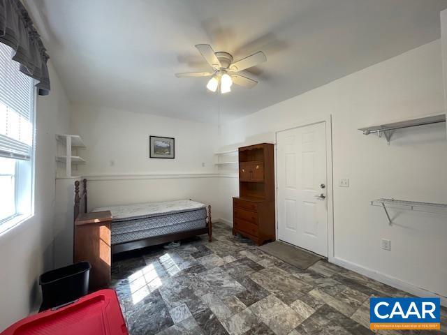 1308 Spruce St, Monterey, VA 24465 - bedroom with ceiling fan and stone finish floor
