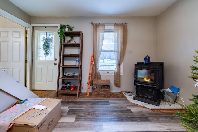 15745 Runions Creek Rd, Broadway, VA 22815 - interior space featuring a wood stove and wood finished floors