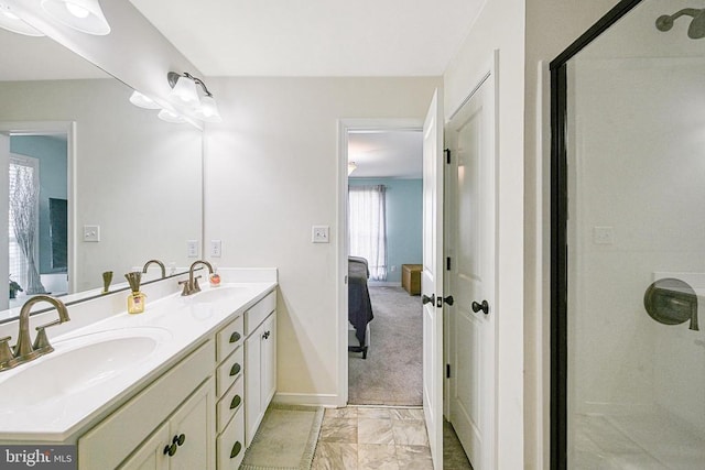 307 Cardinal, Louisa, VA 23093 - ensuite bathroom with double vanity, a stall shower, and marble look tiles