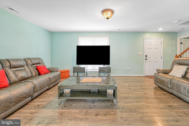 307 Cardinal, Louisa, VA 23093 - living area featuring wood finished floors, stairway, and recessed lighting