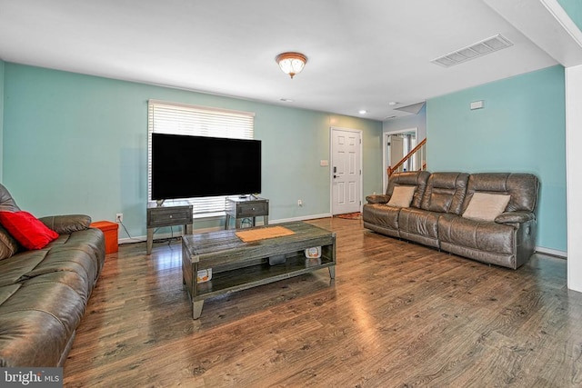 307 Cardinal, Louisa, VA 23093 - living room featuring wood finished floors, stairway, and recessed lighting