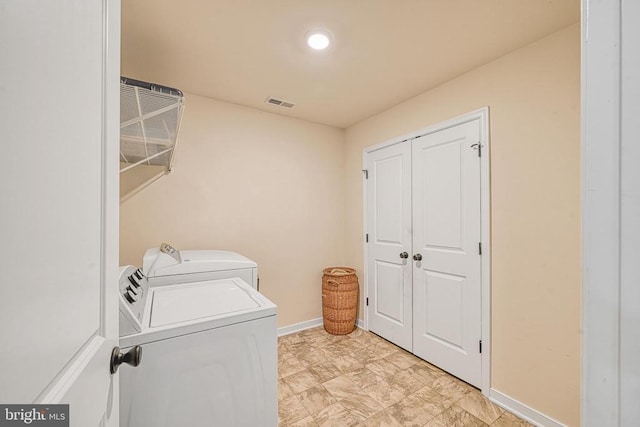 307 Cardinal, Louisa, VA 23093 - laundry area with washer and dryer and baseboards