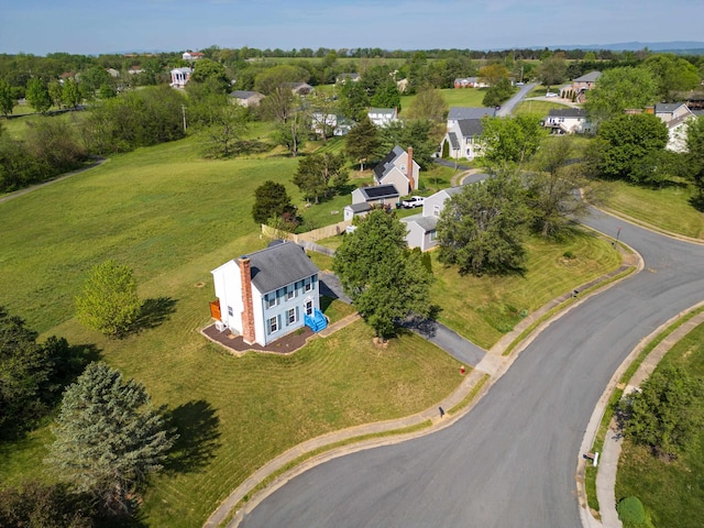 aerial overview of property's location featuring nearby suburban area