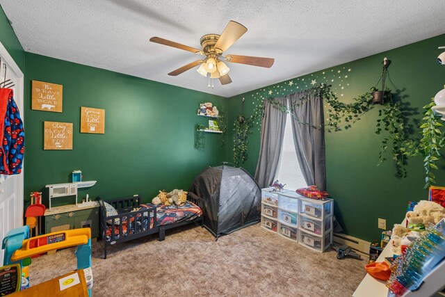carpeted bedroom featuring a textured ceiling and ceiling fan