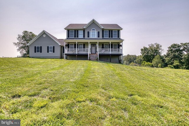 11400 Alvin Ln, Culpeper, VA 22701 - colonial-style house featuring a porch and a front yard