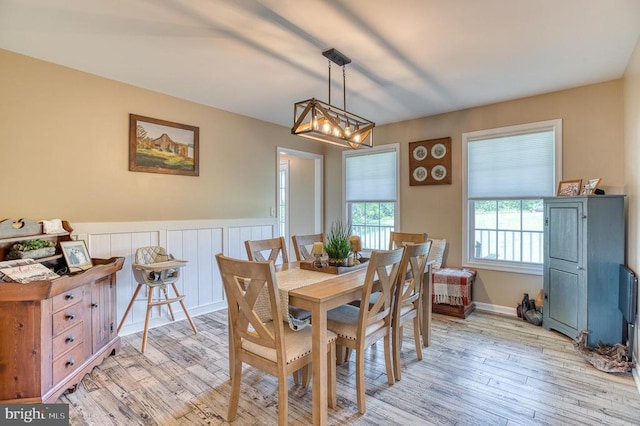 11400 Alvin Ln, Culpeper, VA 22701 - dining area featuring light wood-type flooring, wainscoting, and a chandelier