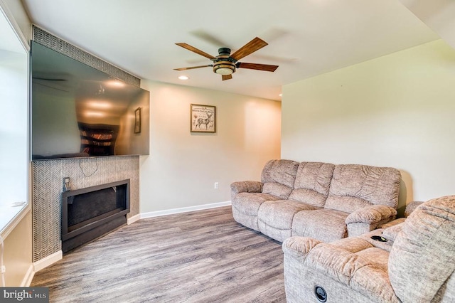 11400 Alvin Ln, Culpeper, VA 22701 - living area with wood finished floors, a ceiling fan, a tile fireplace, and recessed lighting