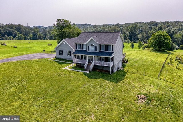 11400 Alvin Ln, Culpeper, VA 22701 - view of front of home featuring a porch, asphalt driveway, and a forest view