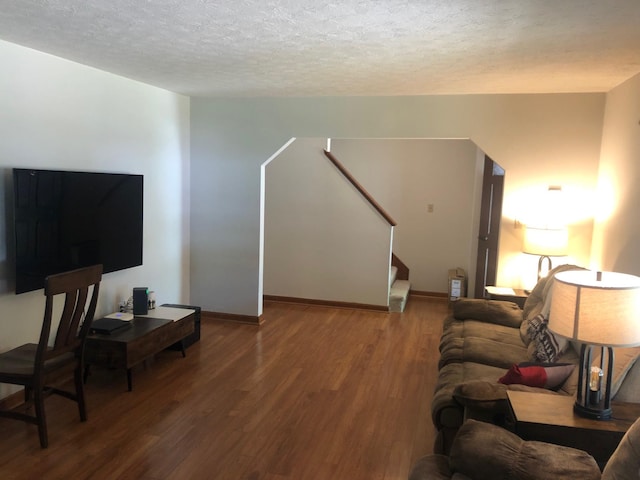 109 Cooper Dr, Stuarts Draft, VA 24477 - living area featuring wood finished floors, a textured ceiling, and stairs