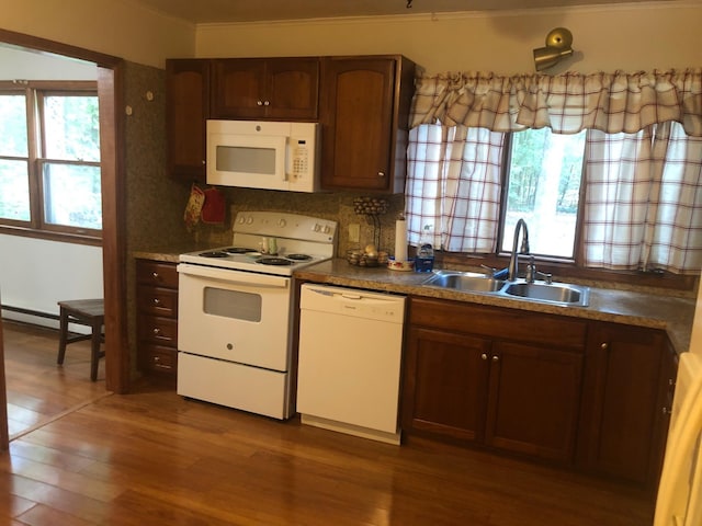 109 Cooper Dr, Stuarts Draft, VA 24477 - kitchen featuring white appliances, wood finished floors, plenty of natural light, and crown molding