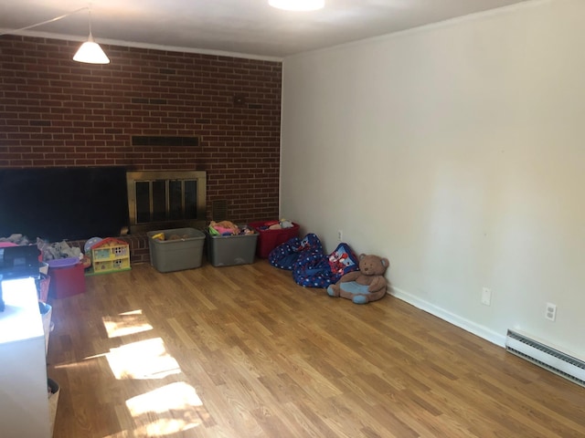 109 Cooper Dr, Stuarts Draft, VA 24477 - unfurnished living room with wood finished floors and a baseboard radiator