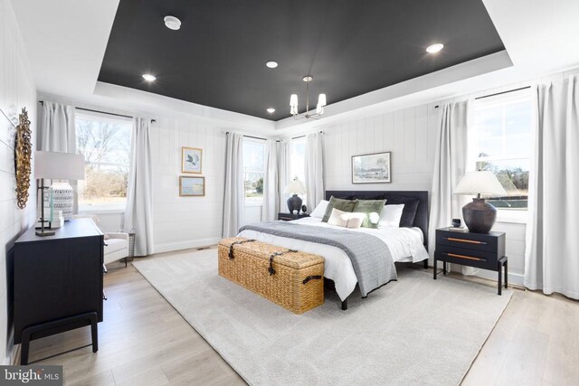 10103 N Streamview Ct, Fredericksburg, VA 22408 - bedroom with a raised ceiling, light wood finished floors, a chandelier, and recessed lighting