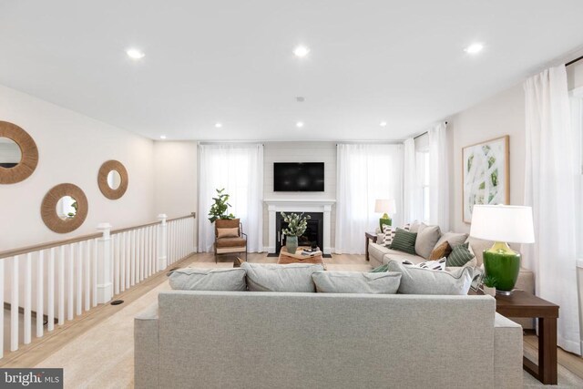 10103 N Streamview Ct, Fredericksburg, VA 22408 - living room featuring recessed lighting and a glass covered fireplace