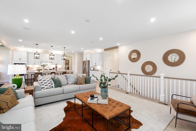 10103 N Streamview Ct, Fredericksburg, VA 22408 - living room featuring recessed lighting and wood finished floors