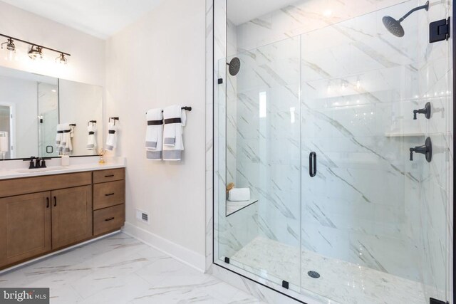 10103 N Streamview Ct, Fredericksburg, VA 22408 - bathroom featuring baseboards, a marble finish shower, marble look tiles, and vanity