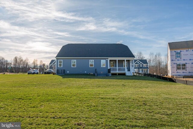 10103 N Streamview Ct, Fredericksburg, VA 22408 - back of house with a yard and covered porch