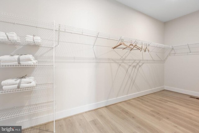 10103 N Streamview Ct, Fredericksburg, VA 22408 - spacious closet featuring wood finished floors