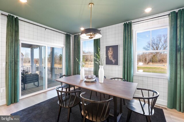 10103 N Streamview Ct, Fredericksburg, VA 22408 - dining room featuring light wood-style floors, plenty of natural light, recessed lighting, and tile walls