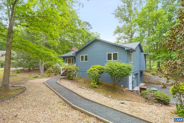 7 Spoon Ter, Palmyra, VA 22963 - view of property exterior featuring a chimney