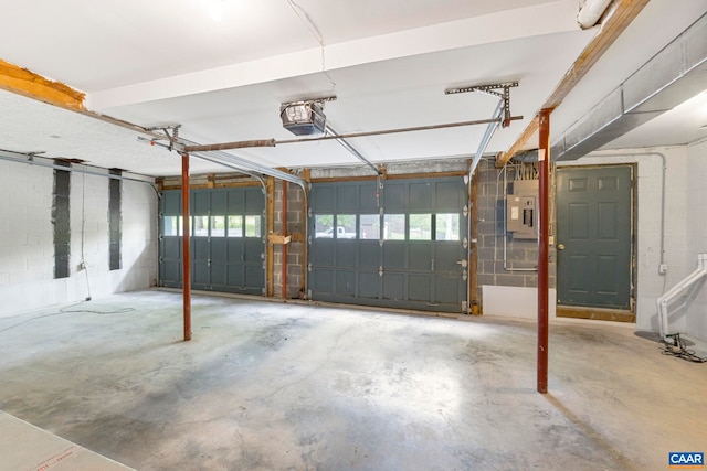 7 Spoon Ter, Palmyra, VA 22963 - garage featuring a garage door opener, electric panel, and concrete block wall