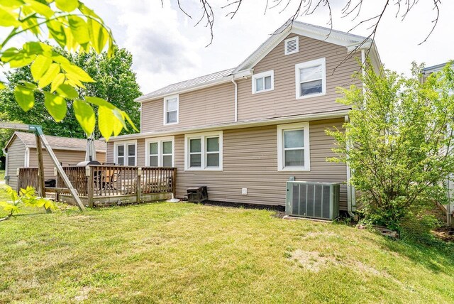 202 Jackson Ave, Elkton, VA 22827 - back of property featuring cooling unit, a wooden deck, and a lawn
