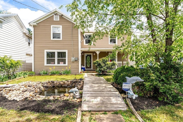 traditional-style house with a porch