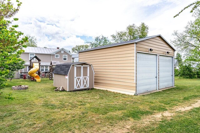 202 Jackson Ave, Elkton, VA 22827 - view of shed featuring a fire pit