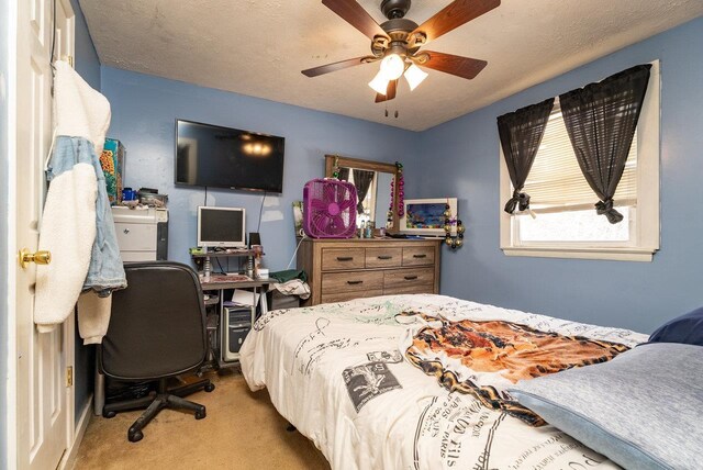 202 Jackson Ave, Elkton, VA 22827 - bedroom with carpet, an office area, and ceiling fan