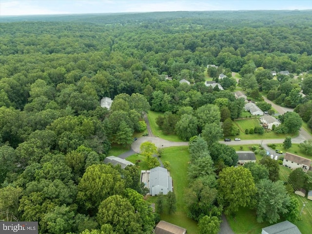  - aerial view of a heavily wooded area