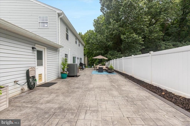  - fenced backyard featuring a patio and outdoor dining area
