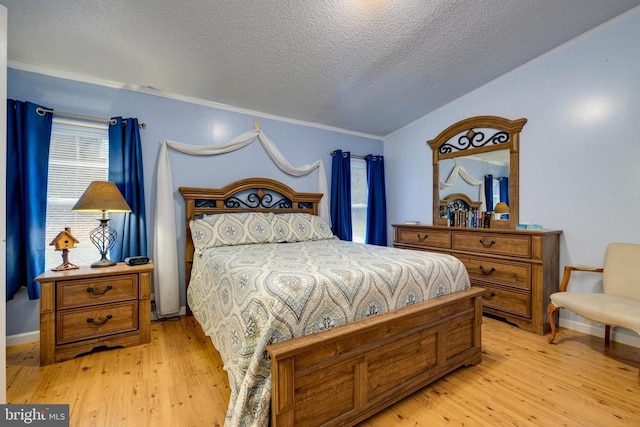 400 Fork River Rd N, Shenandoah, VA 22849 - bedroom featuring light wood-style flooring, a textured ceiling, and crown molding
