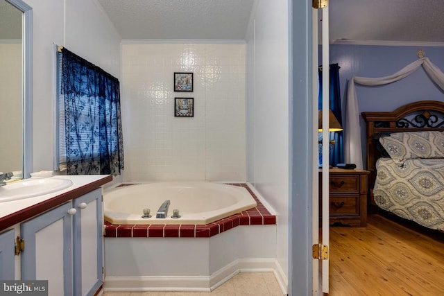 400 Fork River Rd N, Shenandoah, VA 22849 - ensuite bathroom with vanity, a bath, wood finished floors, and crown molding